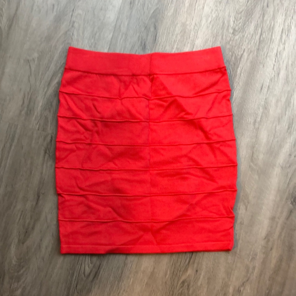 Coral colored mini skirt